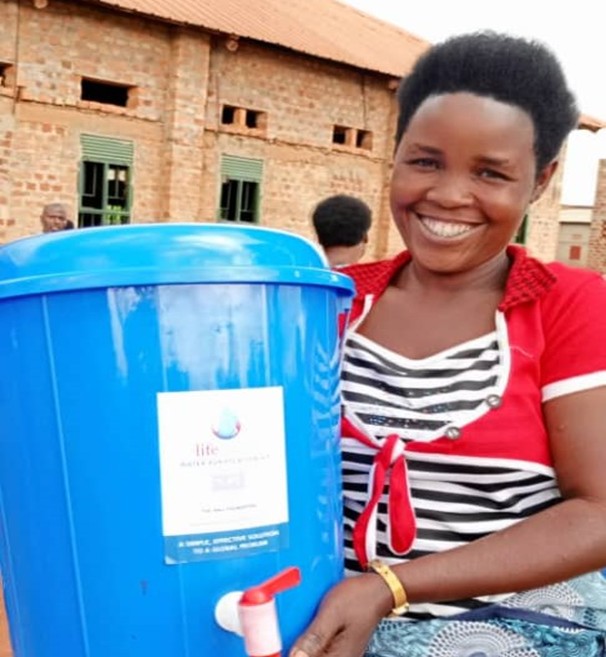 Kakumiro, Kyabasana Village Lifewater Distribution - Happy recipient 1