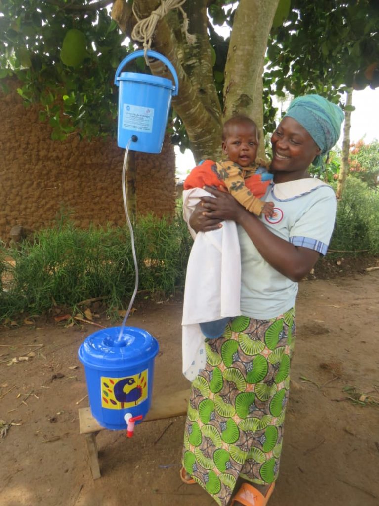 Lifewater Distribution in Kyaka II Refugee Settlem - Happy recipient 2